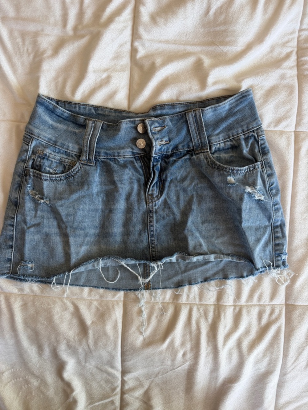 Light Wash Distressed Denim Mini Skirt